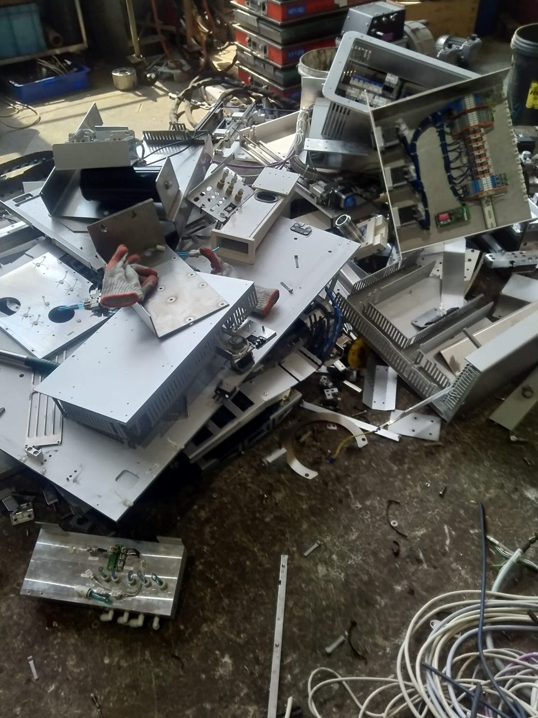 Machine frames and electrical boxes after dismantling